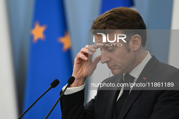 WARSAW, POLAND - DECEMBER 12:
French President Emmanuel Macron during a joint press conference with Polish Prime Minister Donald Tusk at the...