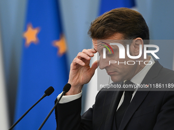 WARSAW, POLAND - DECEMBER 12:
French President Emmanuel Macron during a joint press conference with Polish Prime Minister Donald Tusk at the...