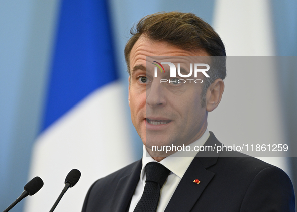 WARSAW, POLAND - DECEMBER 12:
French President Emmanuel Macron during a joint press conference with Polish Prime Minister Donald Tusk at the...