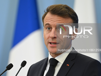 WARSAW, POLAND - DECEMBER 12:
French President Emmanuel Macron during a joint press conference with Polish Prime Minister Donald Tusk at the...