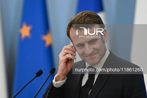 WARSAW, POLAND - DECEMBER 12:
French President Emmanuel Macron during a joint press conference with Polish Prime Minister Donald Tusk at the...