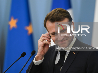 WARSAW, POLAND - DECEMBER 12:
French President Emmanuel Macron during a joint press conference with Polish Prime Minister Donald Tusk at the...