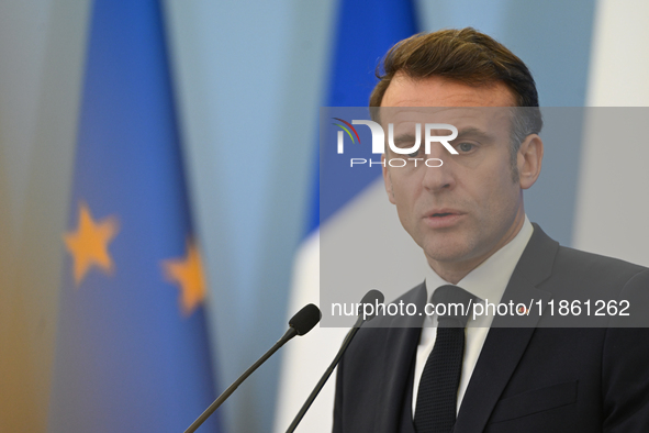 WARSAW, POLAND - DECEMBER 12:
French President Emmanuel Macron during a joint press conference with Polish Prime Minister Donald Tusk at the...