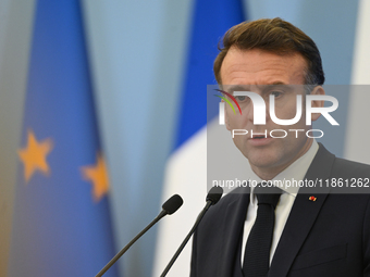 WARSAW, POLAND - DECEMBER 12:
French President Emmanuel Macron during a joint press conference with Polish Prime Minister Donald Tusk at the...