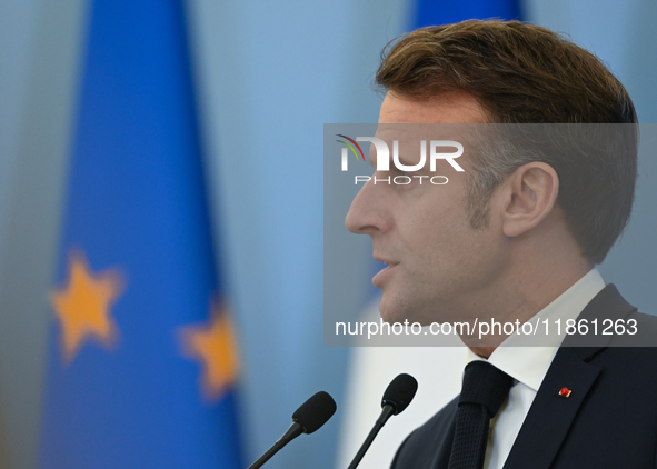 WARSAW, POLAND - DECEMBER 12:
French President Emmanuel Macron during a joint press conference with Polish Prime Minister Donald Tusk at the...