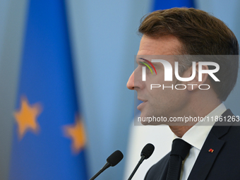 WARSAW, POLAND - DECEMBER 12:
French President Emmanuel Macron during a joint press conference with Polish Prime Minister Donald Tusk at the...