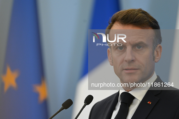 WARSAW, POLAND - DECEMBER 12:
French President Emmanuel Macron during a joint press conference with Polish Prime Minister Donald Tusk at the...