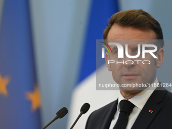 WARSAW, POLAND - DECEMBER 12:
French President Emmanuel Macron during a joint press conference with Polish Prime Minister Donald Tusk at the...