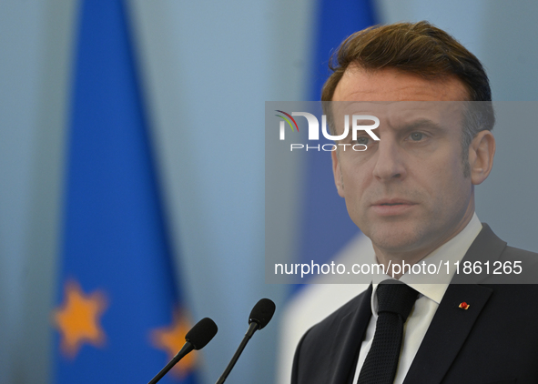 WARSAW, POLAND - DECEMBER 12:
French President Emmanuel Macron during a joint press conference with Polish Prime Minister Donald Tusk at the...