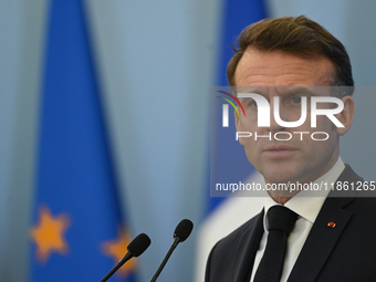 WARSAW, POLAND - DECEMBER 12:
French President Emmanuel Macron during a joint press conference with Polish Prime Minister Donald Tusk at the...