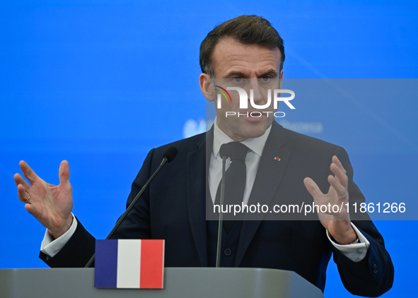 WARSAW, POLAND - DECEMBER 12:
French President Emmanuel Macron during a joint press conference with Polish Prime Minister Donald Tusk at the...