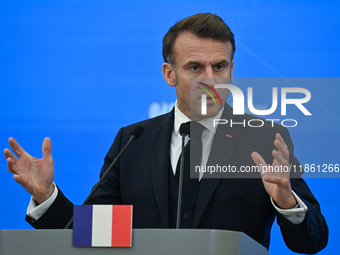 WARSAW, POLAND - DECEMBER 12:
French President Emmanuel Macron during a joint press conference with Polish Prime Minister Donald Tusk at the...