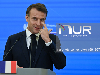 WARSAW, POLAND - DECEMBER 12:
French President Emmanuel Macron delivers remarks during a joint press conference with Polish Prime Minister D...