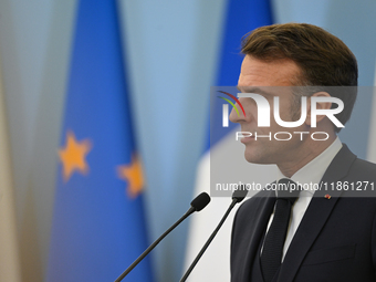 WARSAW, POLAND - DECEMBER 12:
French President Emmanuel Macron during a joint press conference with Polish Prime Minister Donald Tusk at the...