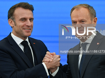 WARSAW, POLAND - DECEMBER 12:
French President Emmanuel Macron (L) and Polish Prime Minister Donald Tusk (R) at the end a joint press confer...