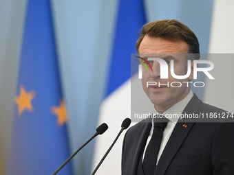 WARSAW, POLAND - DECEMBER 12:
French President Emmanuel Macron during a joint press conference with Polish Prime Minister Donald Tusk at the...