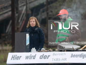 A coffin with ''Here is the mourning for TKBS HR'' is seen as a hundred Thyssenkrupp Europe Steel workers march against planned job cuts bef...