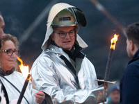 One hundred Thyssenkrupp Europe Steel workers march against planned job cuts before heading to the Works Council meeting in Duisburg, German...