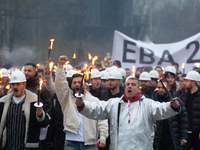 A hundred Thyssenkrupp Europe Steel workers march with a coffin against planned job cuts before heading to the Works Council meeting in Duis...