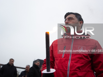 A hundred Thyssenkrupp Europe Steel workers march with a coffin against planned job cuts before heading to the Works Council meeting in Duis...