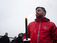 A hundred Thyssenkrupp Europe Steel workers march with a coffin against planned job cuts before heading to the Works Council meeting in Duis...