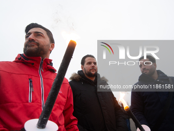 A hundred Thyssenkrupp Europe Steel workers march with a coffin against planned job cuts before heading to the Works Council meeting in Duis...