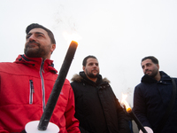 A hundred Thyssenkrupp Europe Steel workers march with a coffin against planned job cuts before heading to the Works Council meeting in Duis...