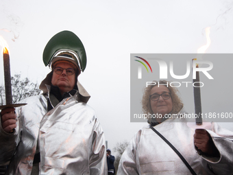 A hundred Thyssenkrupp Europe Steel workers march with a coffin against planned job cuts before heading to the Works Council meeting in Duis...