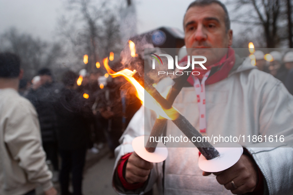 A hundred Thyssenkrupp Europe Steel workers march with a coffin against planned job cuts before heading to the Works Council meeting in Duis...