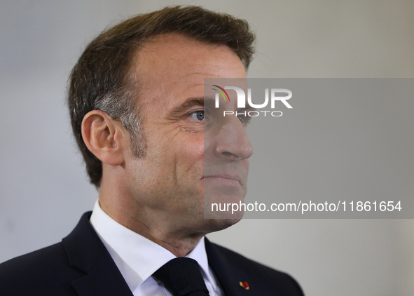 In Warsaw, Poland, on December 12, 2024, French President Emmanuel Macron meets with Polish Prime Minister Donald Tusk at the Chancellery of...