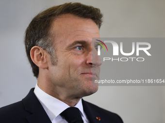 In Warsaw, Poland, on December 12, 2024, French President Emmanuel Macron meets with Polish Prime Minister Donald Tusk at the Chancellery of...