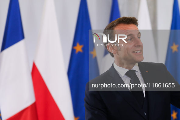 In Warsaw, Poland, on December 12, 2024, French President Emmanuel Macron meets with Polish Prime Minister Donald Tusk at the Chancellery of...