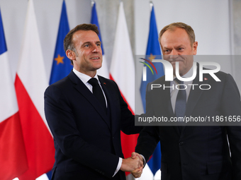 In Warsaw, Poland, on December 12, 2024, French President Emmanuel Macron meets with Polish Prime Minister Donald Tusk at the Chancellery of...