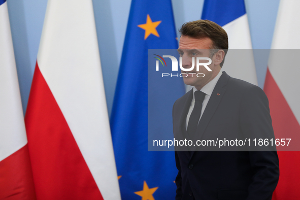 In Warsaw, Poland, on December 12, 2024, French President Emmanuel Macron meets with Polish Prime Minister Donald Tusk at the Chancellery of...