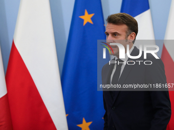 In Warsaw, Poland, on December 12, 2024, French President Emmanuel Macron meets with Polish Prime Minister Donald Tusk at the Chancellery of...