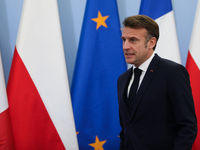 In Warsaw, Poland, on December 12, 2024, French President Emmanuel Macron meets with Polish Prime Minister Donald Tusk at the Chancellery of...