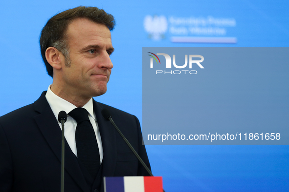 In Warsaw, Poland, on December 12, 2024, French President Emmanuel Macron meets with Polish Prime Minister Donald Tusk at the Chancellery of...