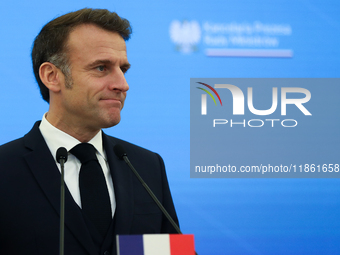 In Warsaw, Poland, on December 12, 2024, French President Emmanuel Macron meets with Polish Prime Minister Donald Tusk at the Chancellery of...