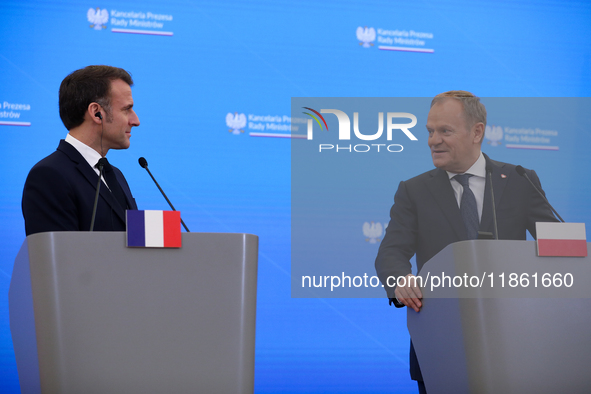 In Warsaw, Poland, on December 12, 2024, President of the French Republic Emmanuel Macron meets with Prime Minister of Poland Donald Tusk at...