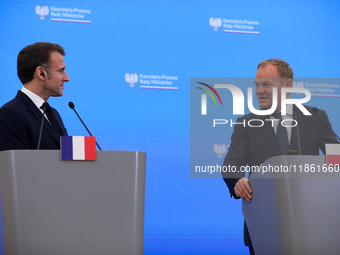 In Warsaw, Poland, on December 12, 2024, President of the French Republic Emmanuel Macron meets with Prime Minister of Poland Donald Tusk at...