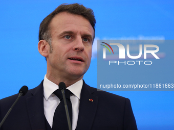 In Warsaw, Poland, on December 12, 2024, French President Emmanuel Macron meets with Polish Prime Minister Donald Tusk at the Chancellery of...