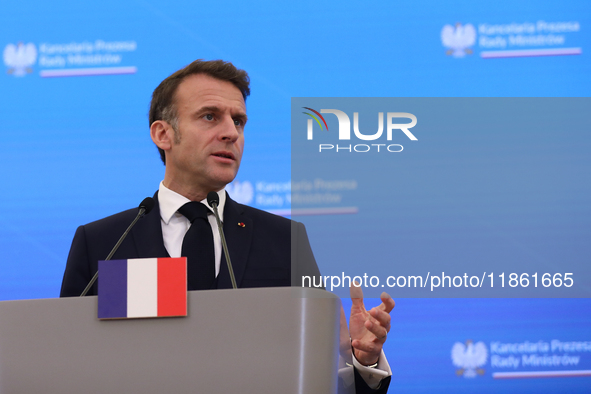 In Warsaw, Poland, on December 12, 2024, French President Emmanuel Macron meets with Polish Prime Minister Donald Tusk at the Chancellery of...