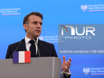 In Warsaw, Poland, on December 12, 2024, French President Emmanuel Macron meets with Polish Prime Minister Donald Tusk at the Chancellery of...