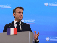 In Warsaw, Poland, on December 12, 2024, French President Emmanuel Macron meets with Polish Prime Minister Donald Tusk at the Chancellery of...