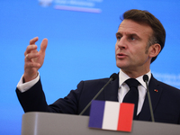 In Warsaw, Poland, on December 12, 2024, French President Emmanuel Macron meets with Polish Prime Minister Donald Tusk at the Chancellery of...