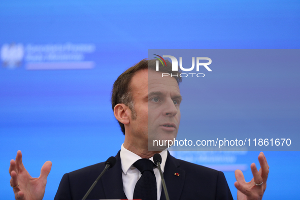 In Warsaw, Poland, on December 12, 2024, French President Emmanuel Macron meets with Polish Prime Minister Donald Tusk at the Chancellery of...