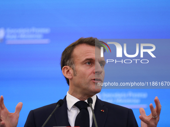 In Warsaw, Poland, on December 12, 2024, French President Emmanuel Macron meets with Polish Prime Minister Donald Tusk at the Chancellery of...