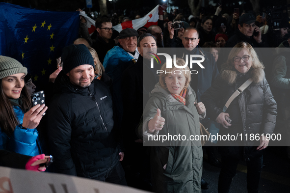 Several MEPs are present during a demonstration against the Georgian government's postponement of European Union accession talks until 2028,...