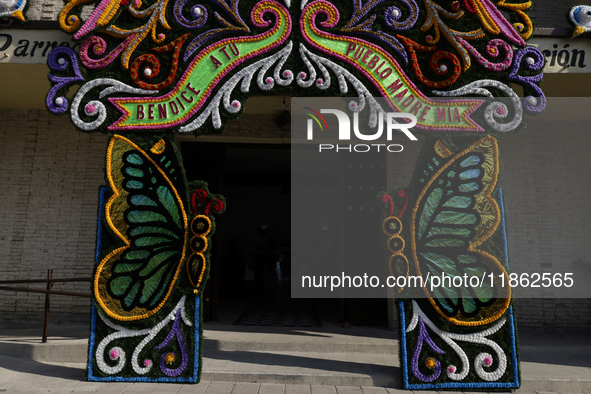 A floral cover is outside a church in Santa Maria Tomatlan in the Iztapalapa borough, Mexico City, on December 12, 2024, for the celebration...