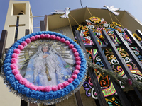 An image of the Virgin of Guadalupe is displayed in Santa Maria Tomatlan in the Iztapalapa municipality, Mexico City, on December 12, 2024,...